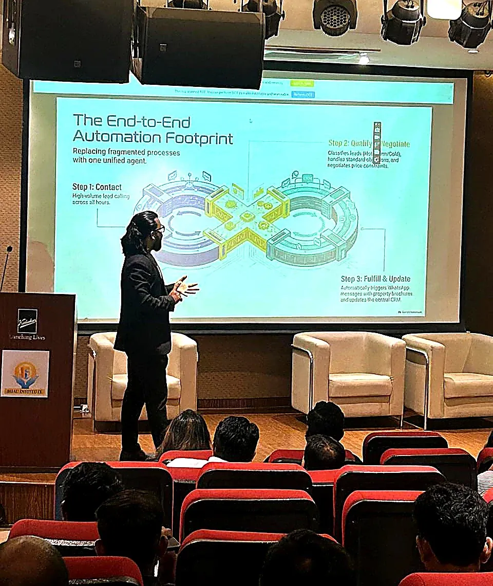 M. Mahendraa presenting to a business audience